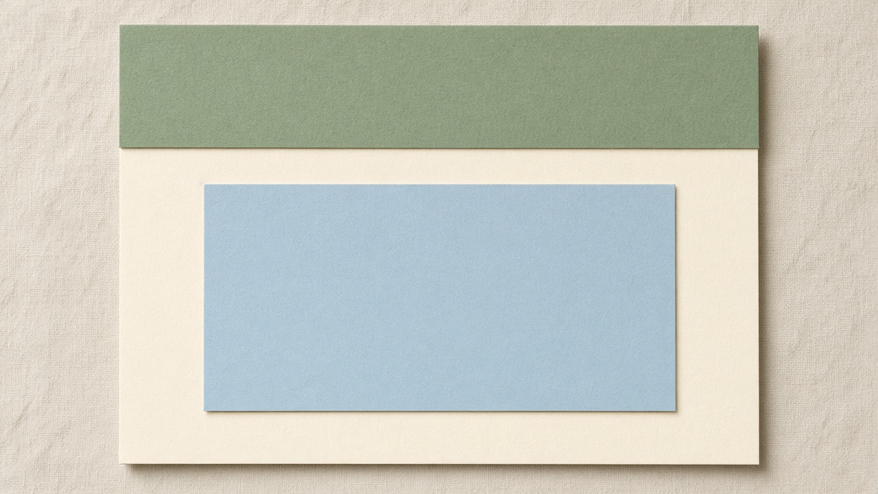 A cream sheet arranged as a page, with a colored band and an empty block.